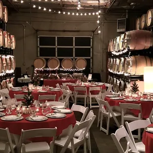 a wine cellar with tables and chairs