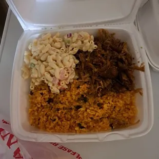 Arroz con gandules and supposed to be Lechon