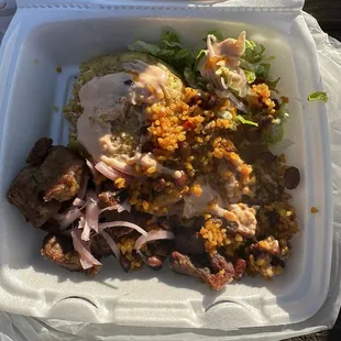 Carne frita con mofongo y arroz manposteao