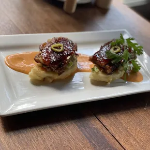 Must try, my uncles favorite dish. Crispy pork belly with ancho glaze on a cheese papusa!