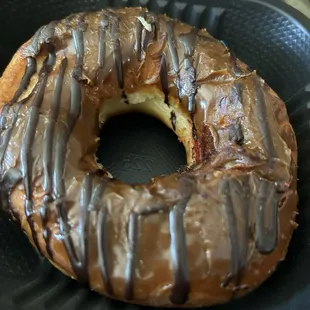 Dry-not-donut baked dough with a hole with jam in the middle