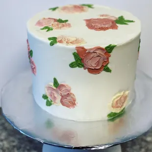 a cake decorated with roses
