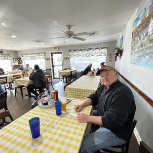 a man sitting at a table