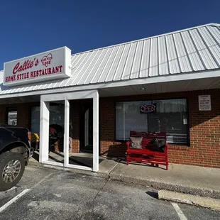 The restaurant is located in the right third of a small building