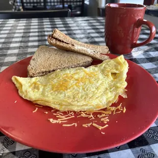 Cheese Omelette with buttered wheat toast