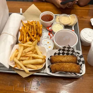 Small Cajun Fries and Small Seasoned Fries and 2pc Boudin Egg Roll