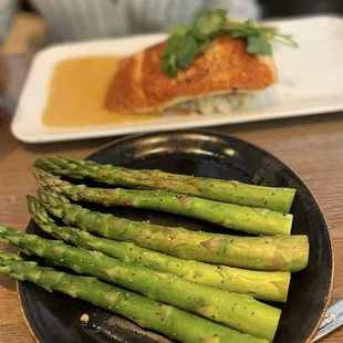Salmon it was so delicious  With a side of asparagus.