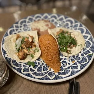 Kid plate, 2 tacos, rice and beans. Everything is quality.