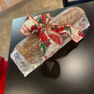 a loaf of bread wrapped in plastic