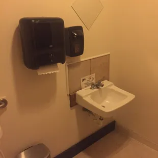 Female single stall restroom.