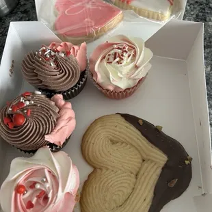 Homemade cupcakes. Heart shaped sugar cookies and the best butter cookie I have ever tasted.
