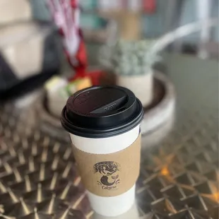 a cup of coffee on a table