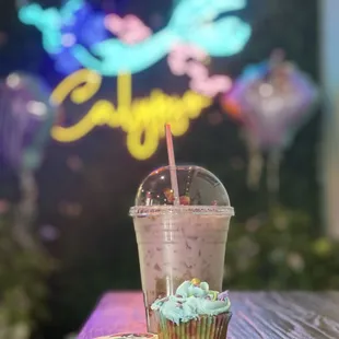 a cupcake and a drink