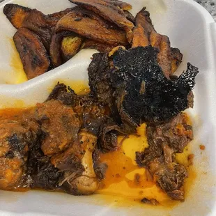 Scorched oxtails and plantains...