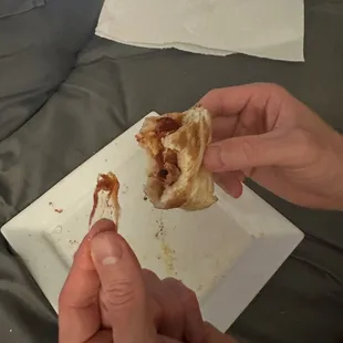 Plastic. Baked in the pizza