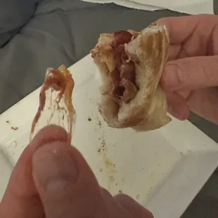 PLASTIC in the pizza.