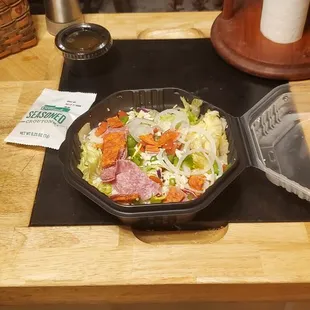A skimpy salad in these new plastic containers.
