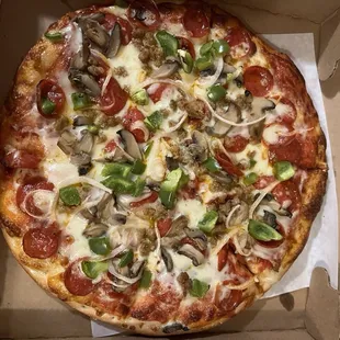 Supreme Pizza added green peppers