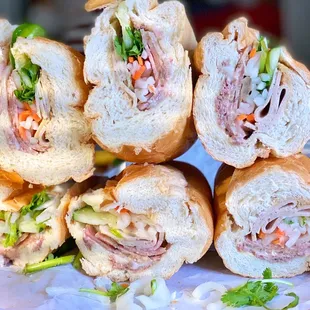 a pile of sandwiches on a table