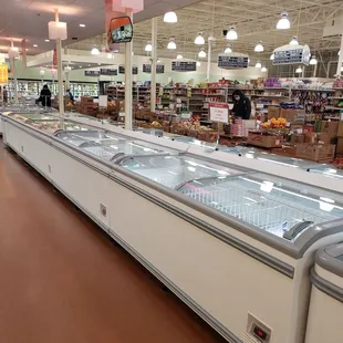 a refrigerated section of a grocery store