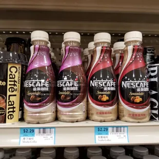 a variety of beverages on a shelf