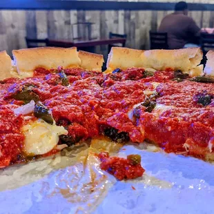 Deep Dish (minus two pieces) with Pepperoni, Onions, &amp; Sweet Peppers