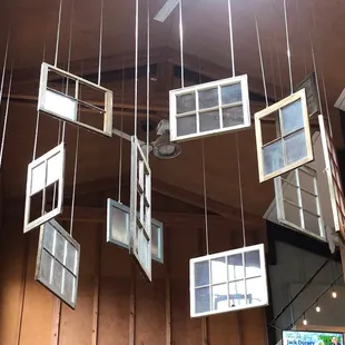 a clock hanging from the ceiling