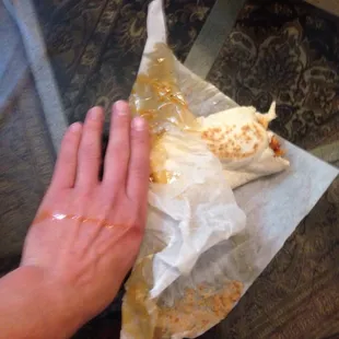 My disgusting burrito advertised for $2.55 that I paid $6.00 for.