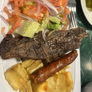 a plate of grilled fish and chips
