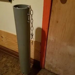 Why is the bathroom key attached to a stripper pole.