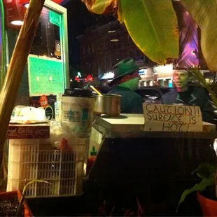 View out to street.  Nice guy that sells great food to passerby.