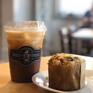 a cup of coffee and a muffin