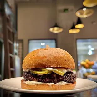Perfectly cooked, perfectly seasoned, perfectly (simply) dressed burger.