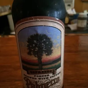 a bottle of beer on a table