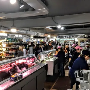 customers in the meat section