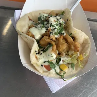 a close up of a taco