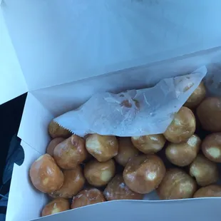 Hot and fresh glazed donut holes