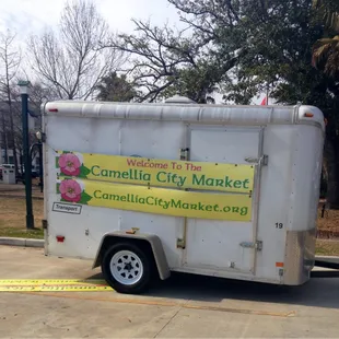 a truck with a sign on it