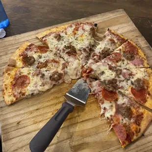 Godfather with extra cheese on half. Thin crust.  Large.