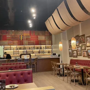 Dining area includes small bar.