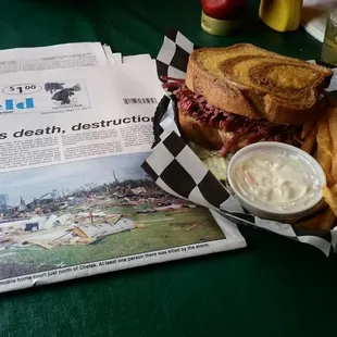 a sandwich and fries on a table