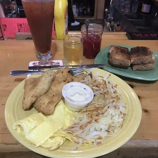 Bluegills, eggs, hash browns, and whole wheat toast with raspberry jam. Bloody Mary w/beer chaser