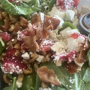 Spinach, walnuts, feta cheese, bacon, fresh strawberries and vinaigrette.