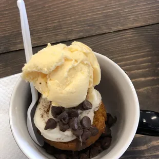 Pumpkin muffin with ice cream and chocolate chips.