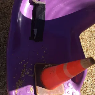 Watch out!  The slide at the playground is broken and the only warning is a cone at the bottom...this could seriously hurt somebody.