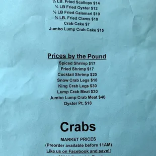 Crab prices posted on sign board out front.