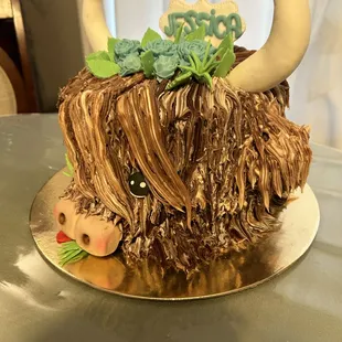 a cake decorated like a yak
