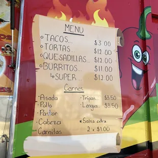 a menu on a food truck
