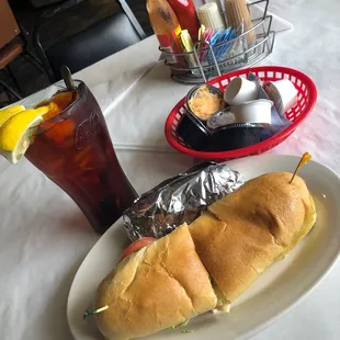Oyster poboy with baked potato. Yummmmm!!!!