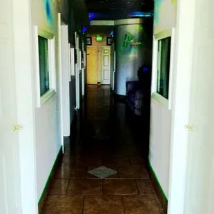 The hall way with cool blacklight decor